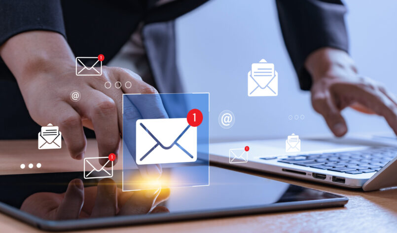 Email marketing workflow concept. professionals using mobile devices, and laptops with glowing message icons, representing campaign automation, outreach strategy, business communication strategy.